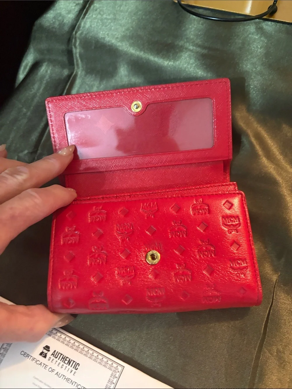 MCM Red Embossed Leather Trifold Wallet with Gold Plaque Accent